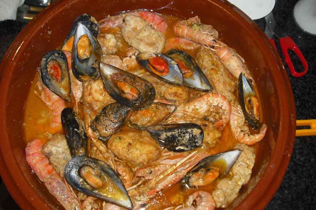 SEAFOOD STEW WITH SAFFRON,  SERRANO HAM & ALMONDS